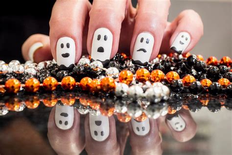 Get Spooky and Chic with These Witchy Nail Art Designs